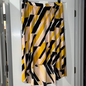 Lane Bryant multi colored high/low mid length skirt. Size 18/20.
